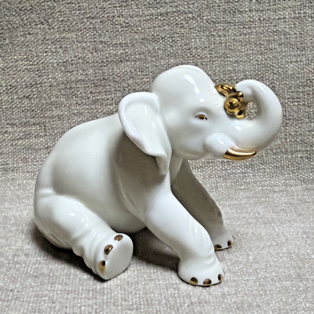 PG Handcrafted In Malaysia White Ceramic Sitting Elephant With Gold Accents